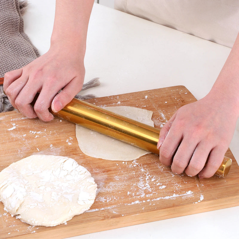 Woman with Gold Stainless Steel Rolling Pin